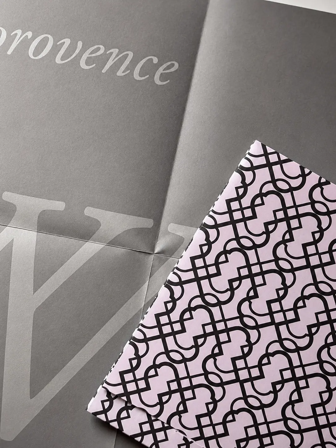 Close view of Baldessarini invitation typography and pattern